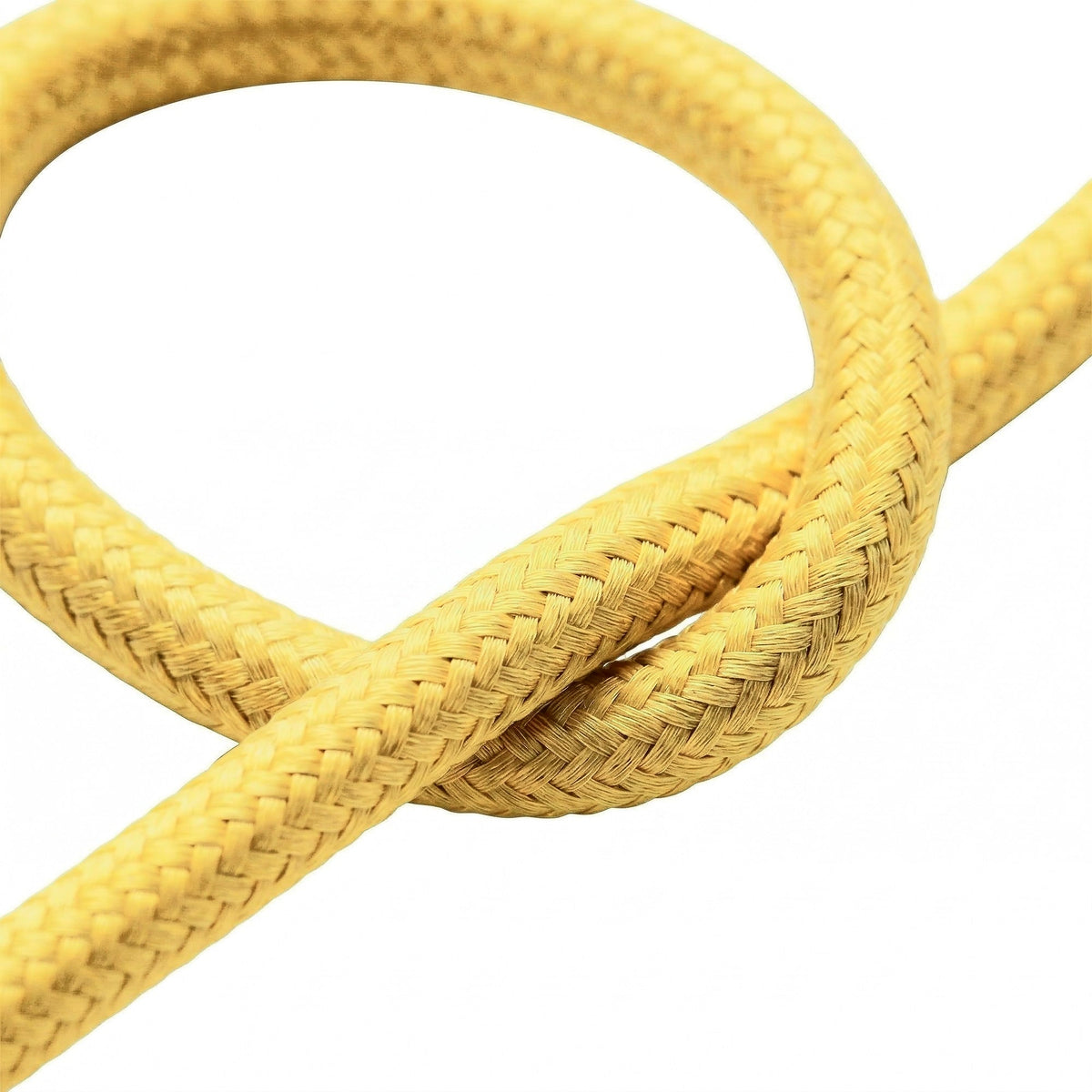 Primer plano del cable textil liso, efecto seda amarillo maíz