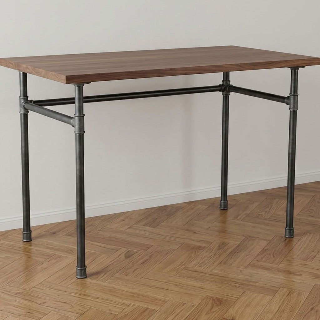 Escritorio industrial con tablero de nogal sobre estructura en U de hierro fundido y acero Ø 27 mm, ambiente (tablero no incluido)
