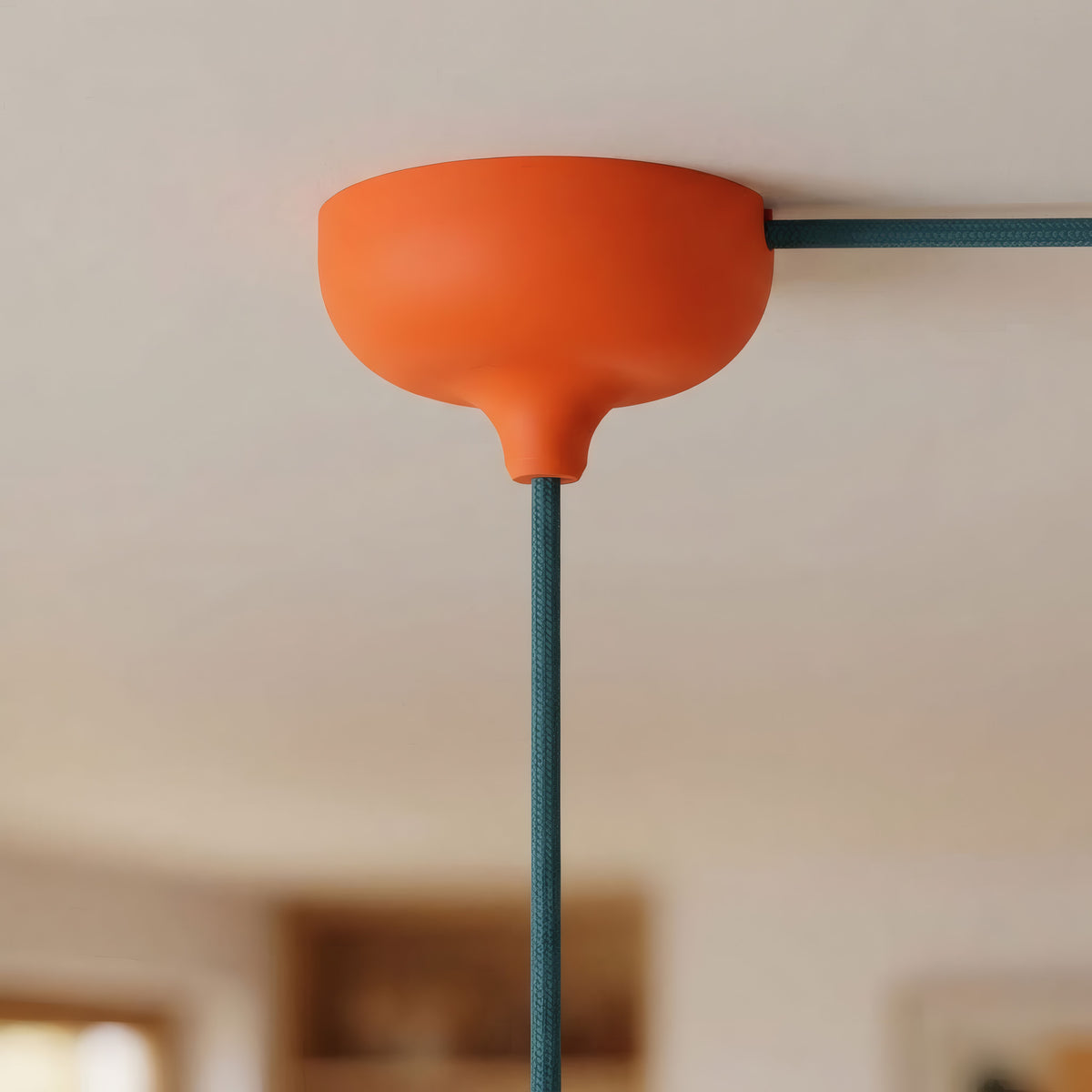 Florón de silicona Ø 88 mm, orificio central, salida lateral — Naranja