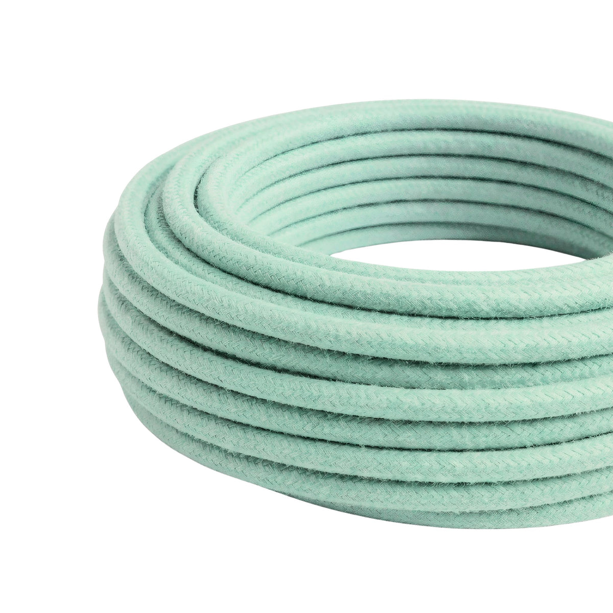 Cable textil redondo de algodón – Menta lechosa, rollo visto de tres cuartos