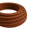 Cable textil redondo de algodón – Marrón canela, rollo en primer plano