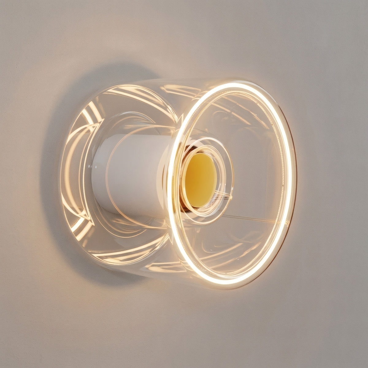 Bombilla LED donut E27 de cristal transparente, Ø 120 mm, encendida como aplique de pared en una decoración minimalista