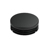 Tapón de plástico negro para racor hembra 1″1/4 33x42, vista superior de la cabeza plana