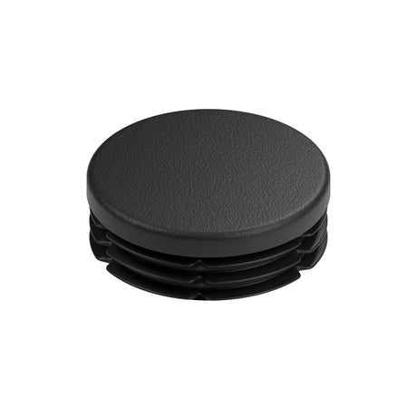 Tapón de plástico negro para racor hembra 1″1/4 33x42, vista superior de la cabeza plana