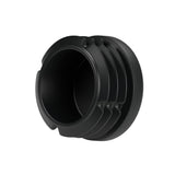 Tapón de plástico negro para racor hembra 3/4″ 20x27, vista inferior: cuerpo hueco y aletas