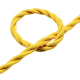 Primer plano del cable textil trenzado, efecto seda amarillo maíz