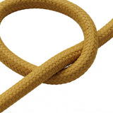 Primer plano del cable textil liso, efecto seda amarillo mostaza