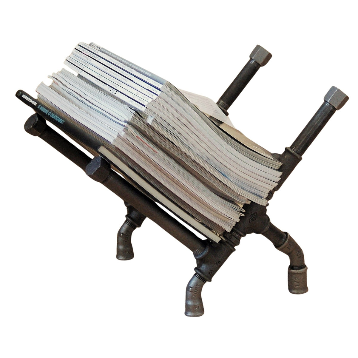 Revistero de hierro fundido y acero para decoración industrial