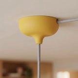 Florón de silicona Ø 88 mm, orificio central, salida lateral — Amarillo