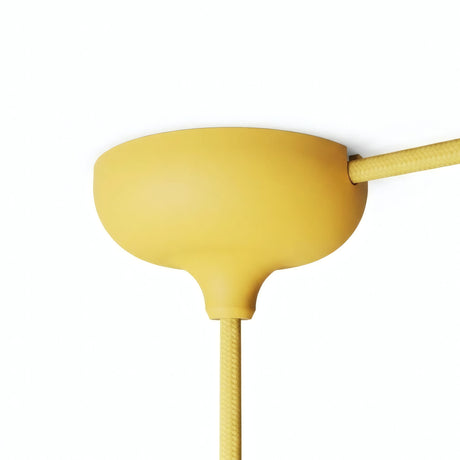 Florón de silicona Ø 88 mm, orificio central, salida lateral — Amarillo