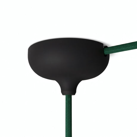 Florón de silicona Ø 88 mm, orificio central, salida lateral — Negro