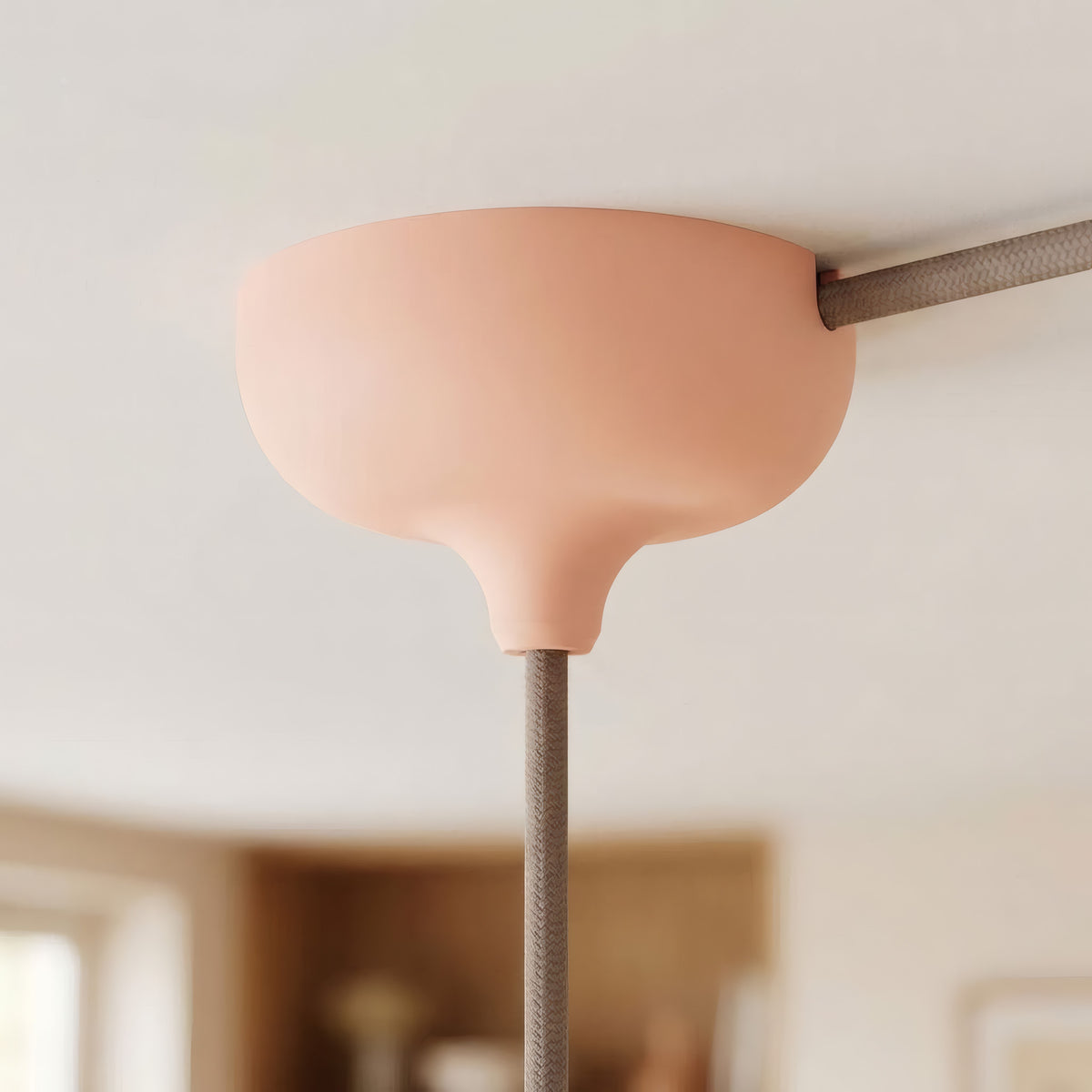 Florón de silicona Ø 88 mm, orificio central, salida lateral — Salmón